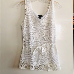 White lace sleeveless crochet top.